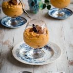 Sweet Potato Mousse served with chocolate and cocoa powder in a glass